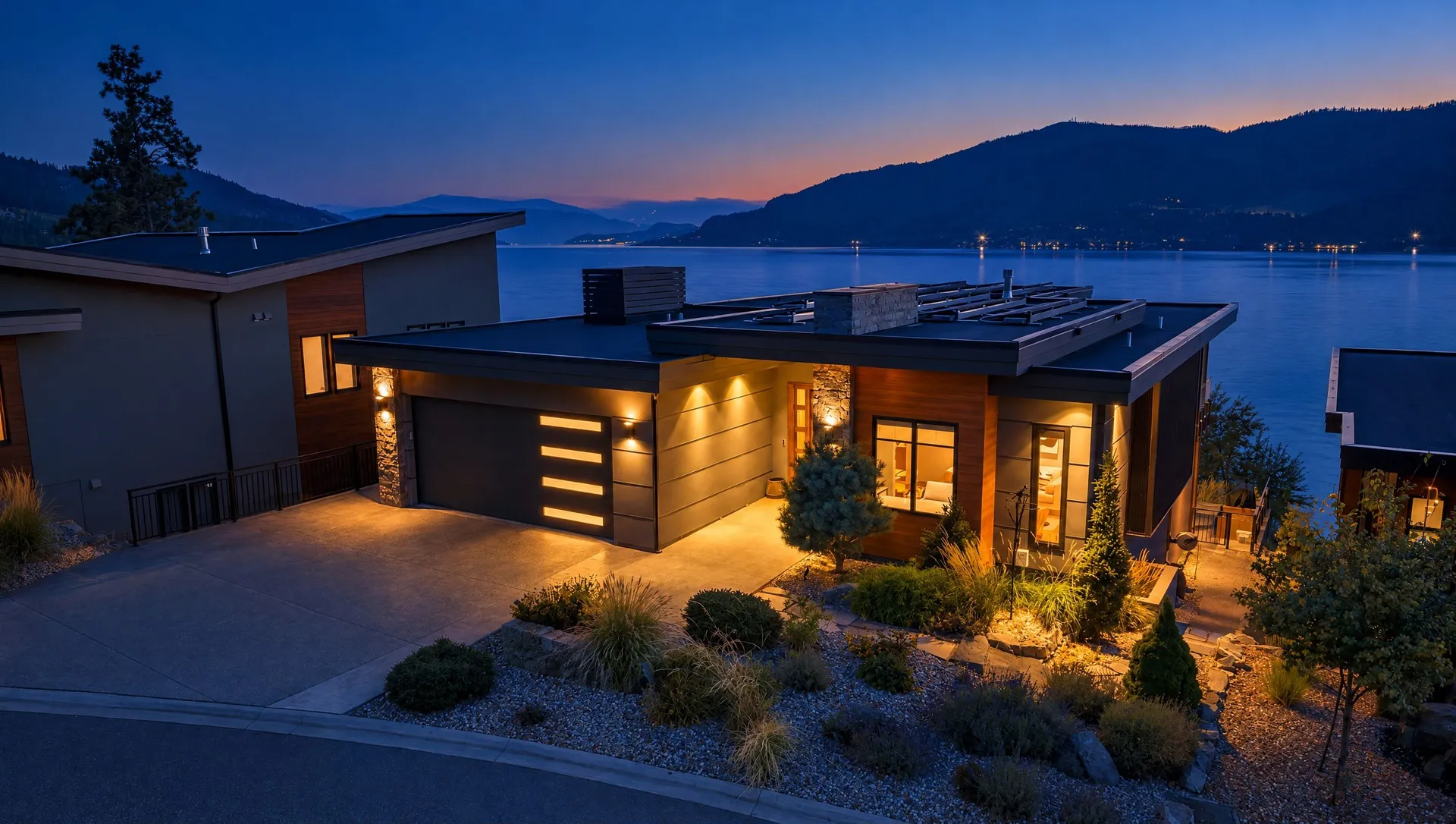 Modern lake-view home in Lakestone, Lake Country at blue hour, real estate photo by Pixel Pro