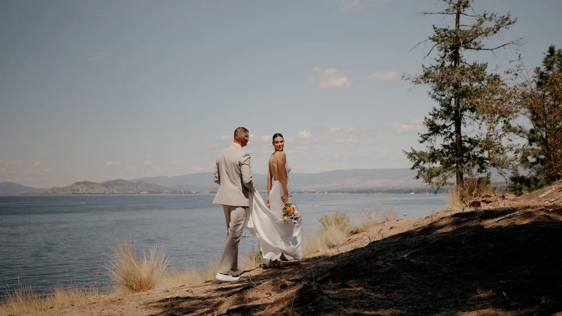 Bride and groom above Okanagan Lake, still from a Pixel Pro wedding film