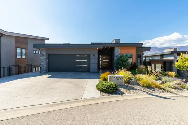 Front exterior, lake-view modern home in Lakestone, Lake Country, BC. Real estate photography by Pixel Pro Productions.