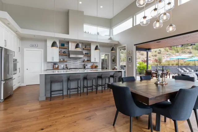 Kitchen dining, luxury lake-view home in Lakestone, Lake Country, BC. Real estate photography by Pixel Pro Productions.
