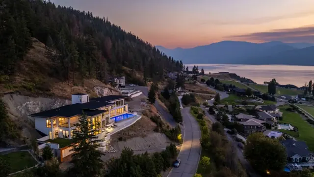 Aerial view sunset, luxury hillside estate in Vernon, BC. Real estate photography by Pixel Pro Productions.