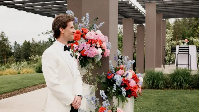 Groom at the altar: Catherine & Matt's wedding at CedarCreek Estate Winery, Kelowna. Still from the Pixel Pro wedding film.