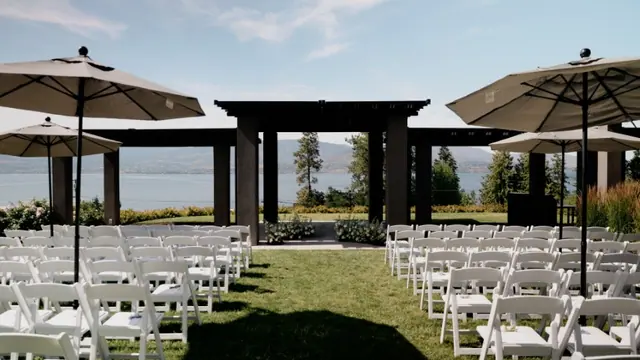 Ceremony setup: Quinn & Steve's wedding at CedarCreek Estate Winery, Kelowna. Still from the Pixel Pro wedding film.