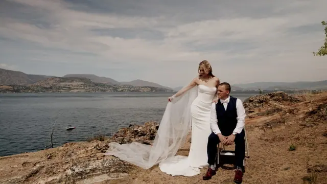 Clifftop above the lake: Quinn & Steve's wedding at CedarCreek Estate Winery, Kelowna. Still from the Pixel Pro wedding film.