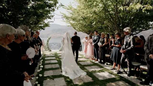 Ceremony aisle: Kiana & Nick's wedding at Chateau Okanagan, Kelowna. Still from the Pixel Pro wedding film.