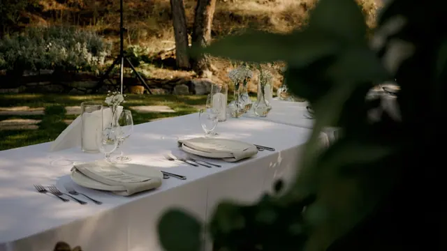 Reception table: Kiana & Nick's wedding at Chateau Okanagan, Kelowna. Still from the Pixel Pro wedding film.