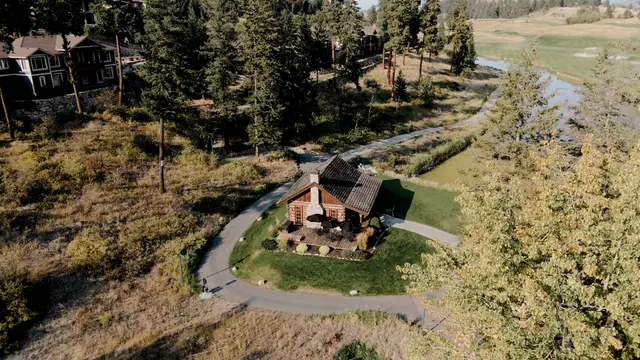 Aerial lodge: Nadia & Dean's wedding at Predator Ridge, Vernon. Still from the Pixel Pro wedding film.