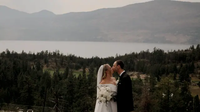 Couple above the lake: Nadia & Dean's wedding at Predator Ridge, Vernon. Still from the Pixel Pro wedding film.