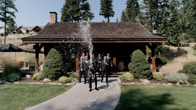 Lodge champagne: Nadia & Dean's wedding at Predator Ridge, Vernon. Still from the Pixel Pro wedding film.