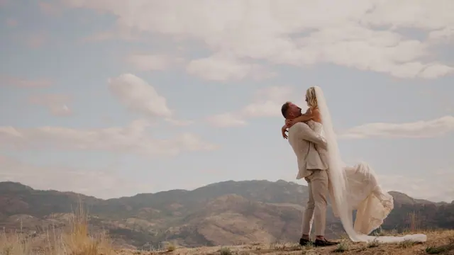 Lift against the sky: Stephanie & Julian's wedding at Sanctuary Gardens, West Kelowna. Still from the Pixel Pro wedding film.